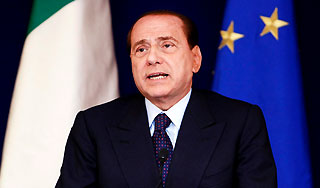 Берлускони назвал Италию "полицейской"