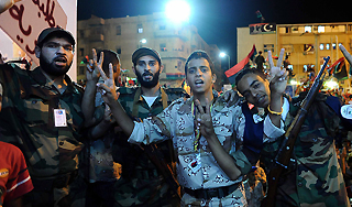 Мятежники заплатят за Каддафи $1,7 млн